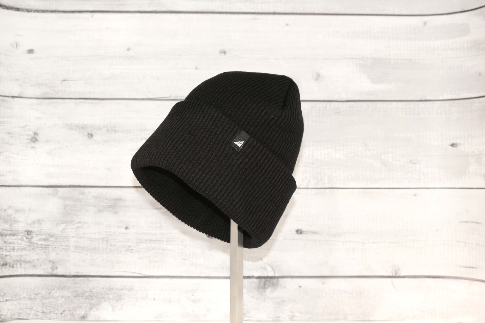Adult Acrylic Cuff Hat – Soft Knit Beanie in black, showcasing a comfortable and stylish design for cold weather.