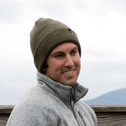 Adult Acrylic Cuff Hat – Soft Knit Beanie worn by a man outdoors, showcasing warmth and comfort.