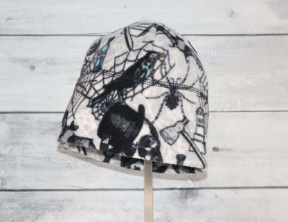 Adult Fleece Cap – Warm Stretch Beanie with spider and web design, perfect for cold weather wear.