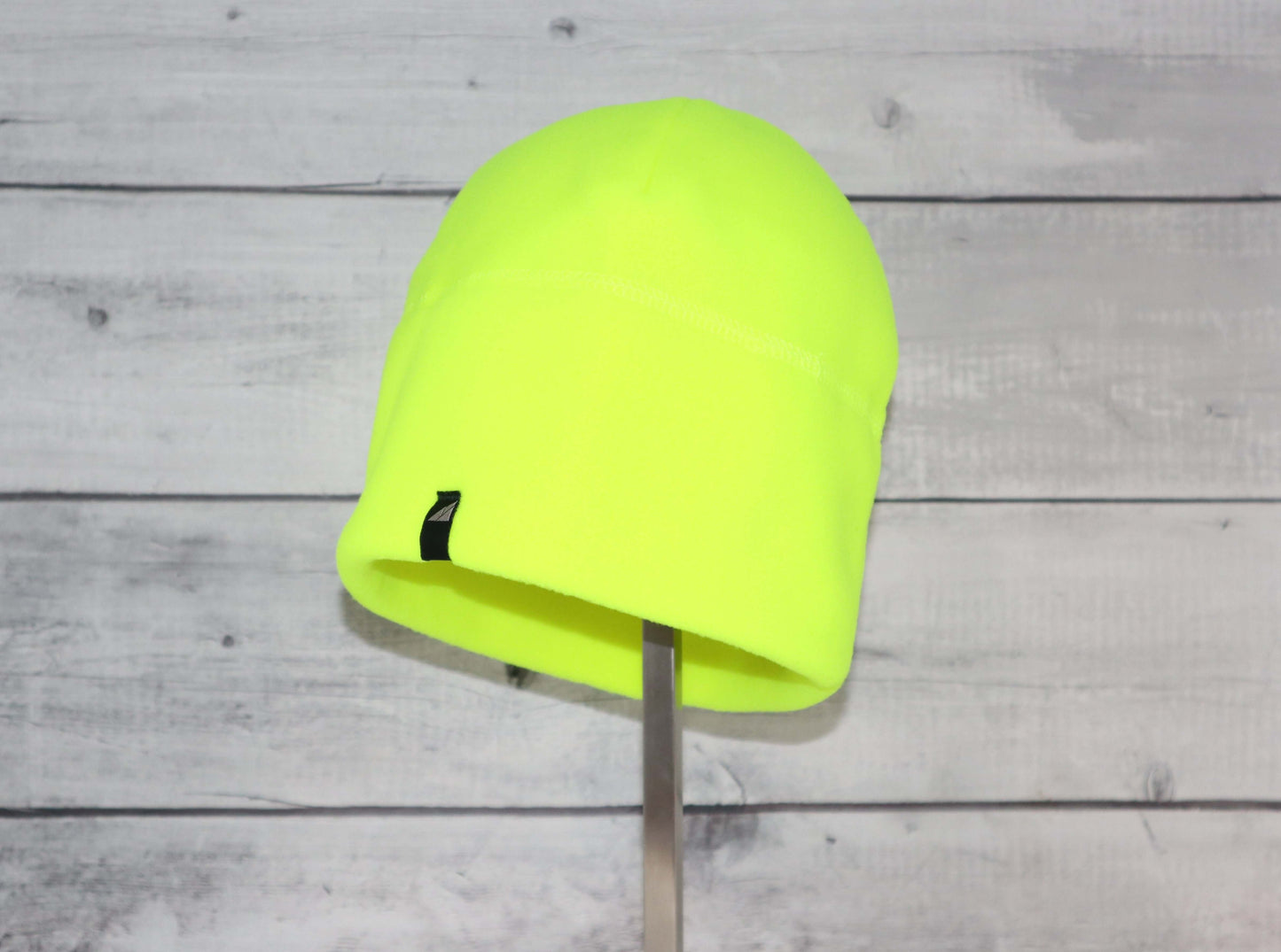 Adult Fleece Cap – Warm Stretch Beanie in bright neon yellow on display