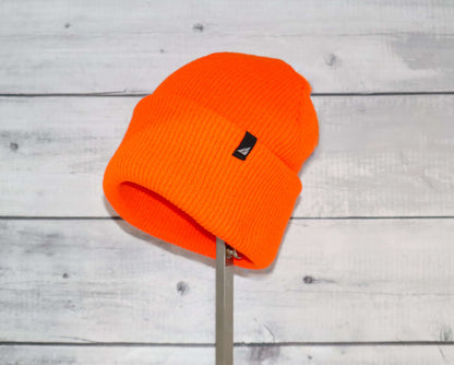 Adult Versatile Wool Watch Cap – Flexible Fit Winter Beanie in bright orange color, designed for cold weather and outdoor activities.
