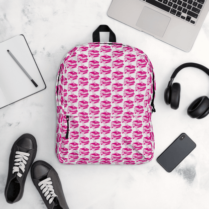 Stylish Pack & Play Backpack in bold pink pattern, perfect for school and sports, with practical features.