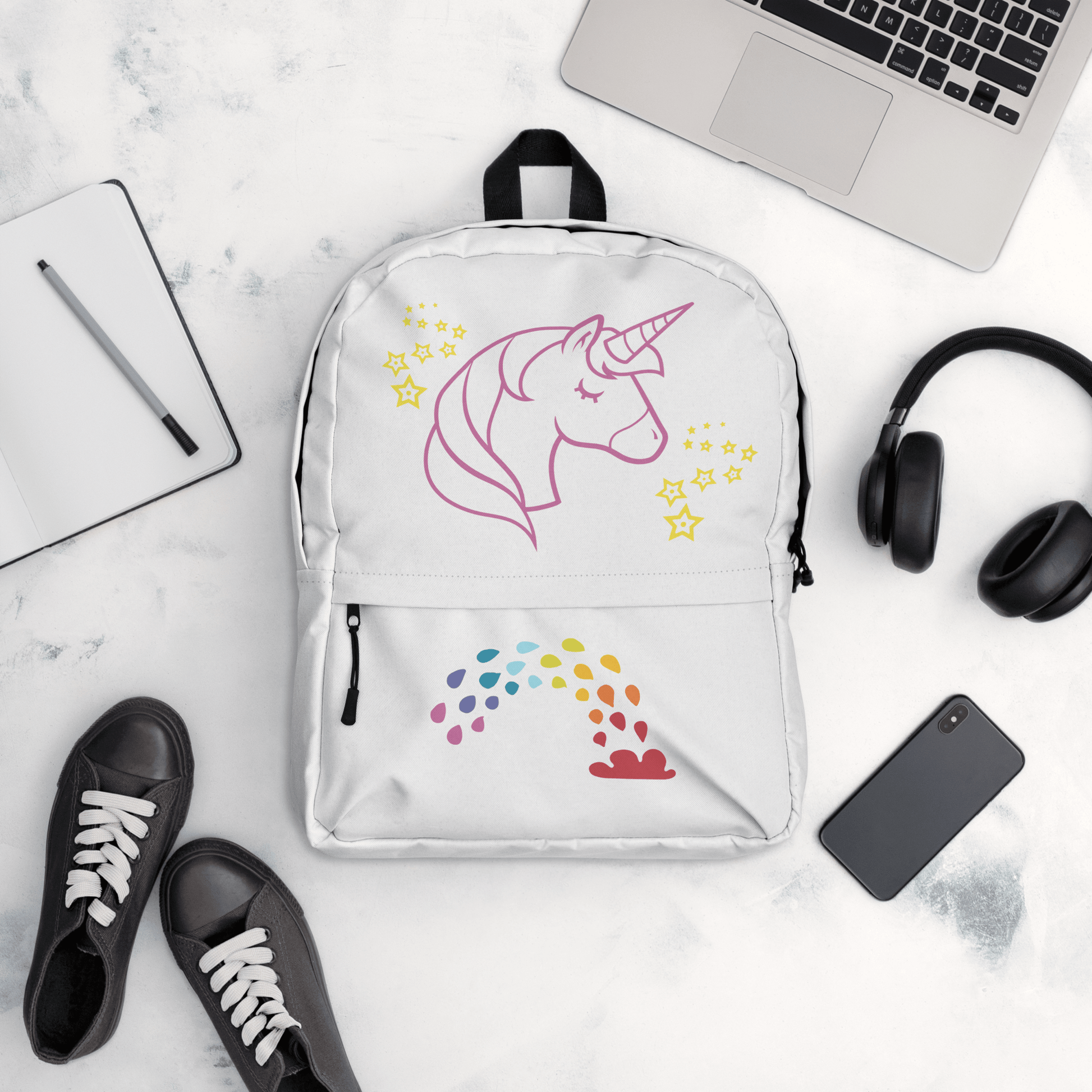 Unicorn Dreams Backpack with rainbow design, water-resistant, perfect for school or adventures.