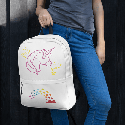 User holding Unicorn Dreams Backpack with whimsical unicorn design, perfect for adventures and school.