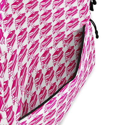 Close-up of the pink patterned interior of the Pack & Play Backpack, showcasing its stylish design and functional pocket.