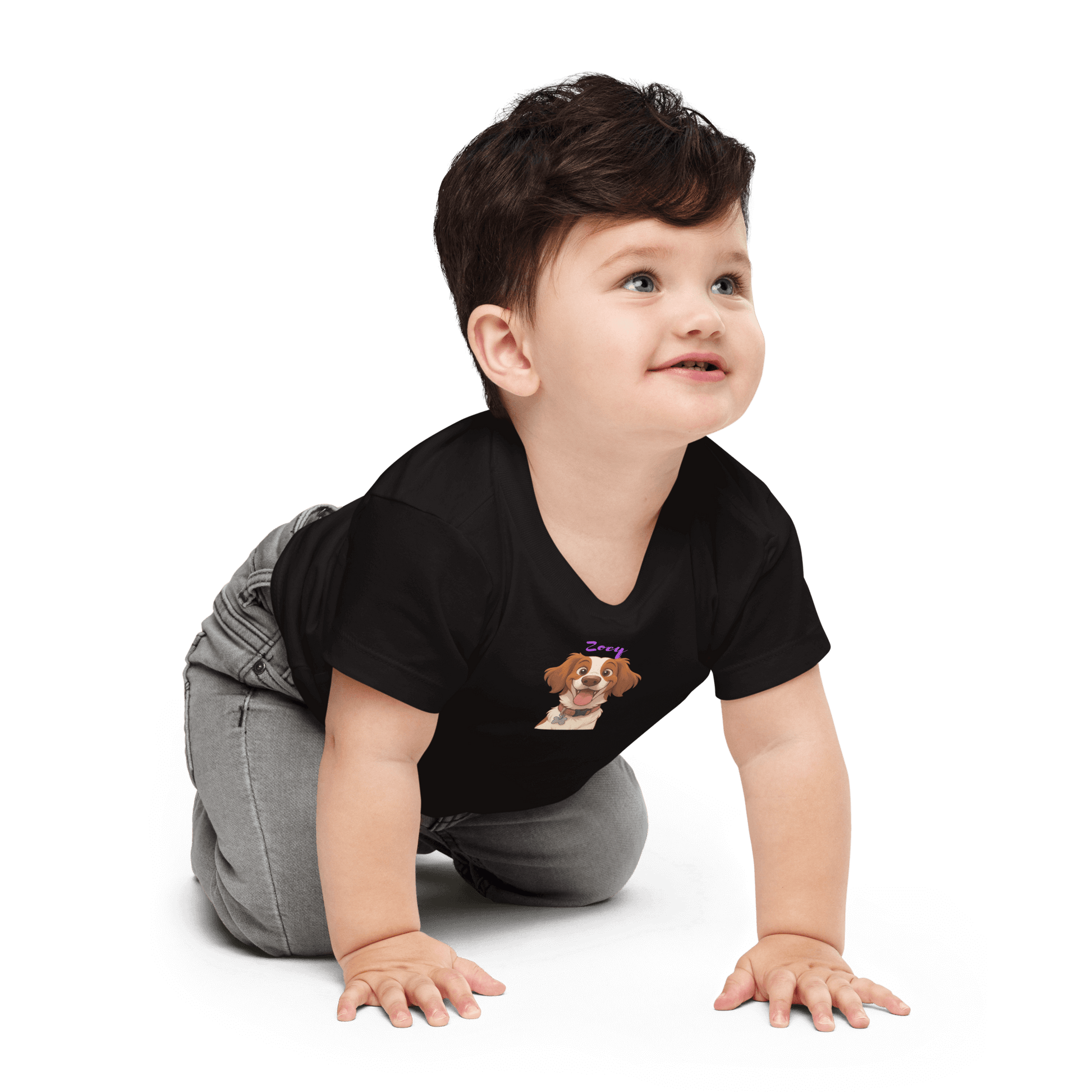 Baby crawling in a custom cartoon pet tee, featuring a dog illustration on a black shirt for personalized charm.