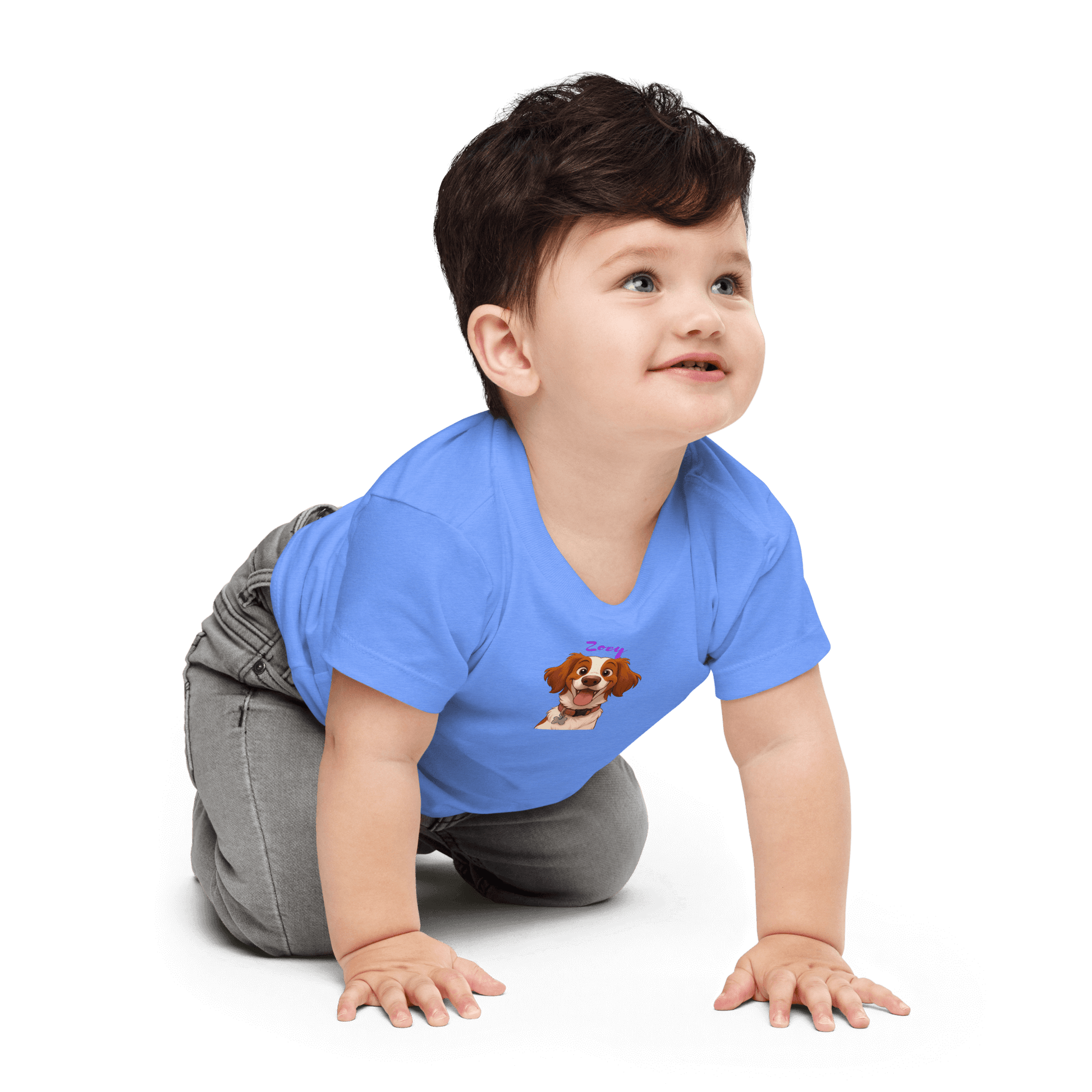 Baby in a blue custom cartoon pet shirt, smiling and crawling, showcasing a unique design with a pet illustration.