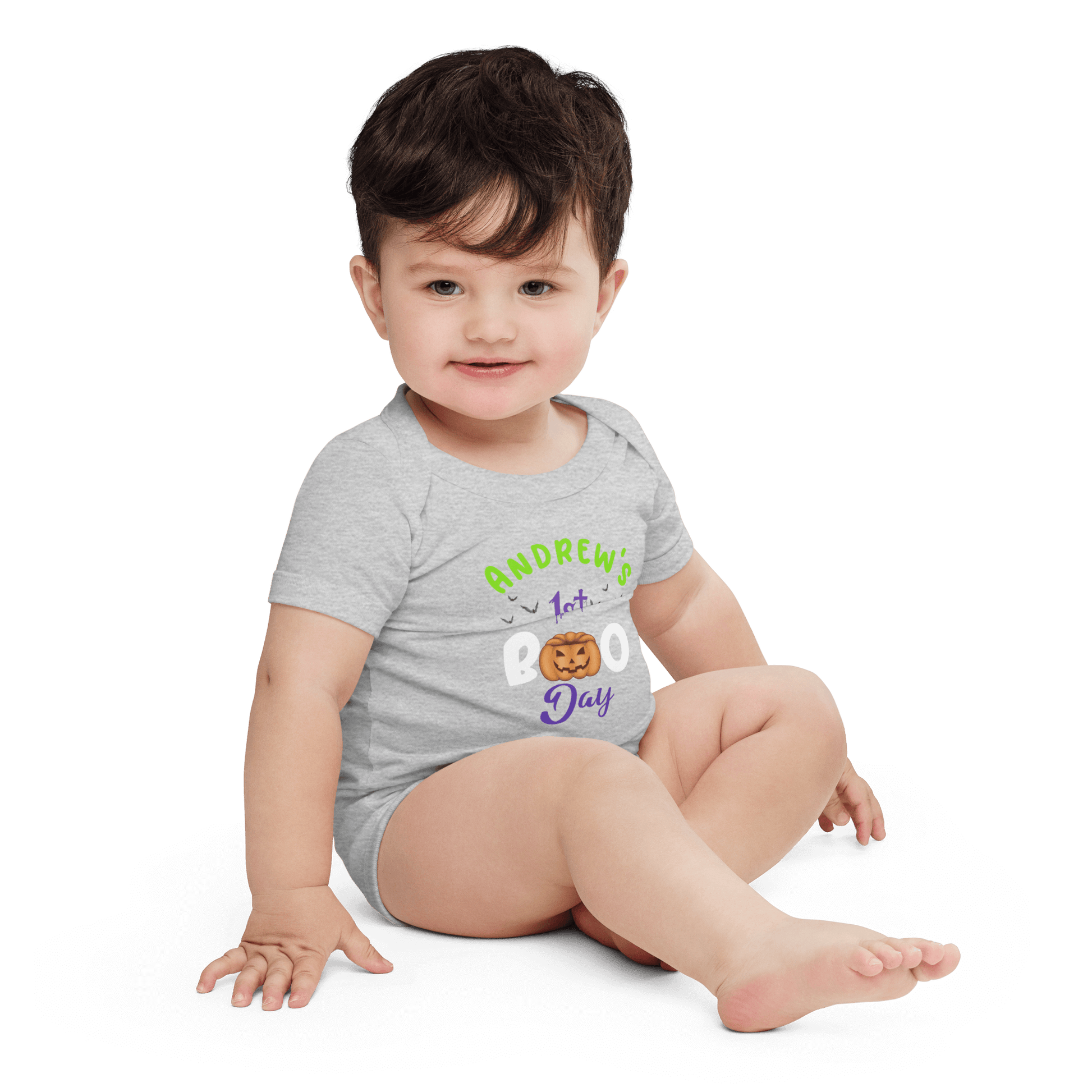 Personalized baby bodysuit for 1st Halloween, featuring playful pumpkin design and festive colors.
