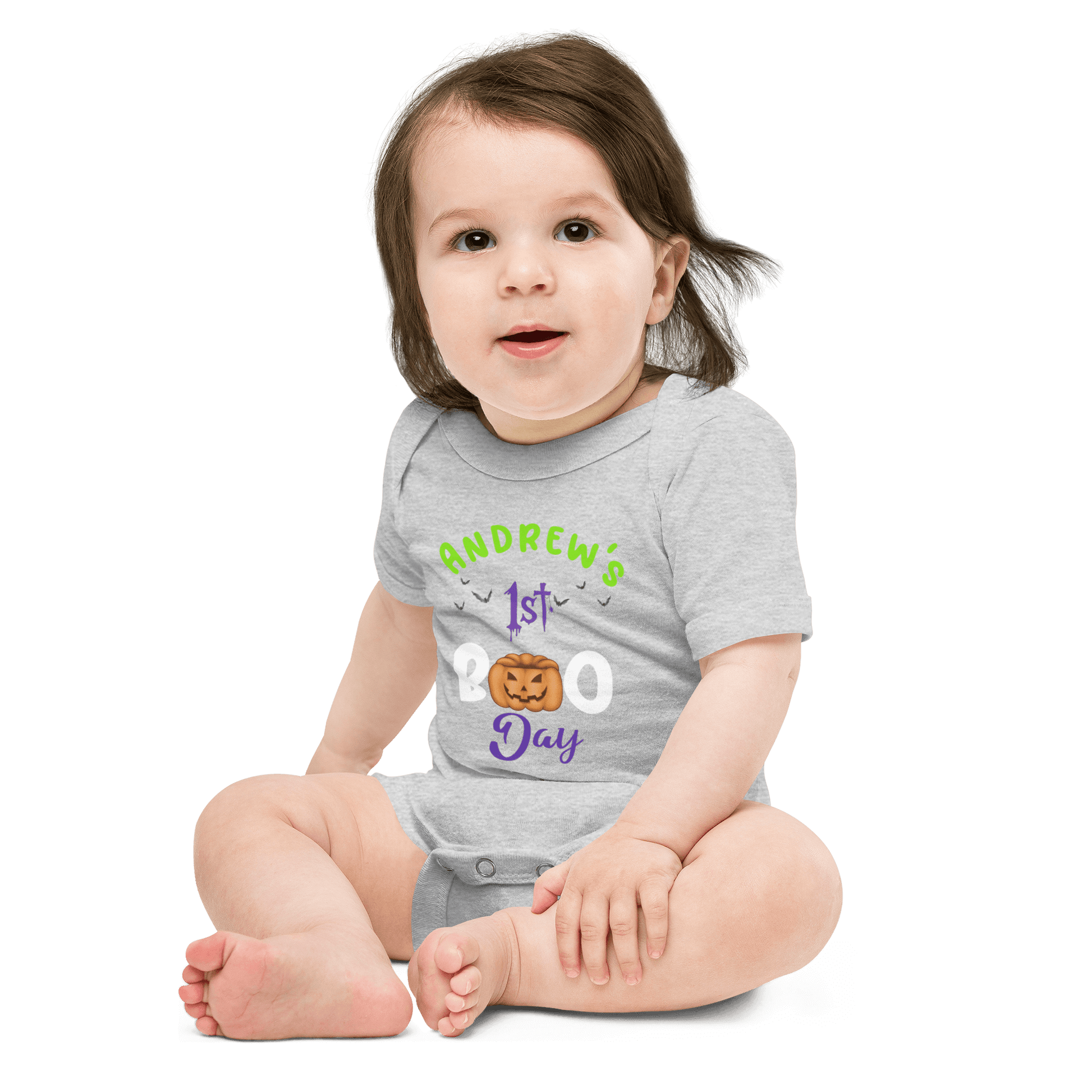 Personalized baby bodysuit for Halloween with festive text and playful pumpkin design.