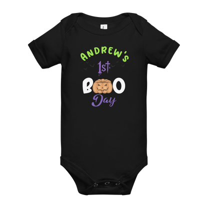 Personalized black baby bodysuit for 1st Halloween with pumpkin design and colorful text.