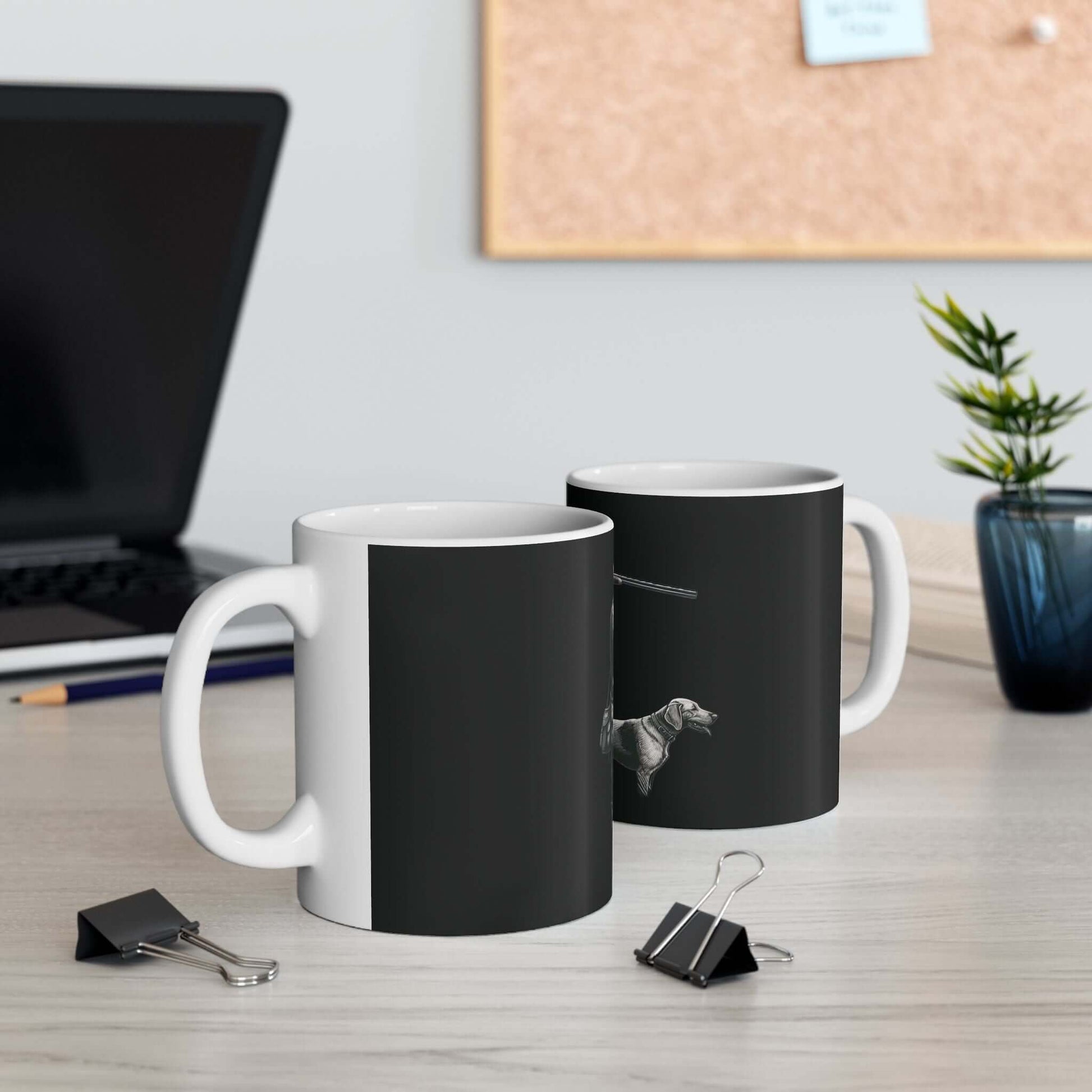 Personalized hunting enthusiast mug set on a desk with a stylish black design and a dog illustration.