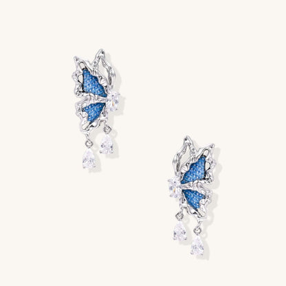 Blue Denim Butterfly Drop Earrings with Crystal Teardrop Sparkle, featuring denim butterflies and sparkling crystal drops.