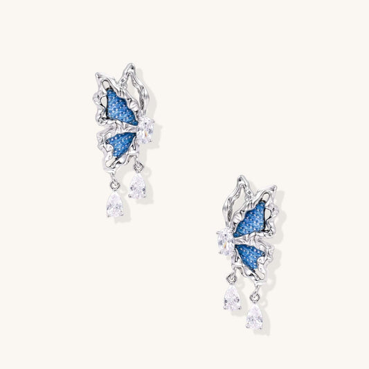 Blue Denim Butterfly Drop Earrings with Crystal Teardrop Sparkle, featuring denim butterflies and sparkling crystal drops.