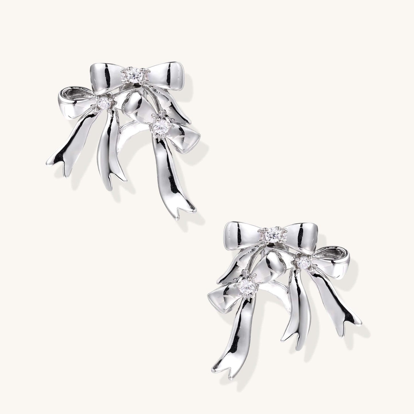Bow Drop Earrings – Delicate Statement Studs with Crystal Sparkle featuring sparkling zirconia accents.