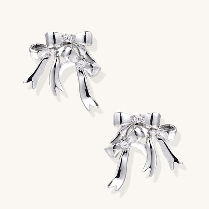 Bow Drop Earrings – Delicate Statement Studs with Crystal Sparkle featuring sparkling zirconia accents.