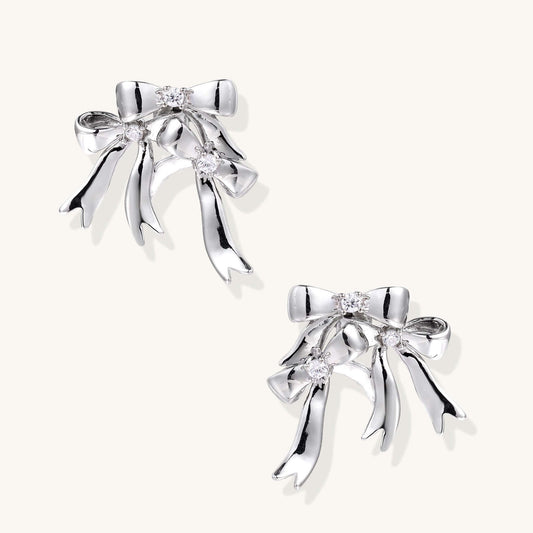 Bow Drop Earrings – Delicate Statement Studs with Crystal Sparkle featuring sparkling zirconia accents.