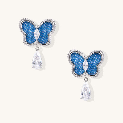 Butterfly Drop Earrings – Crystal Details for Dreamy Statement Style featuring blue butterfly design with sparkling zirconia.