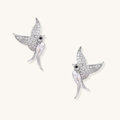 Celestial Hummingbird Earrings with Crystal Wings and Gold Shine showcasing shimmering zirconia accents.