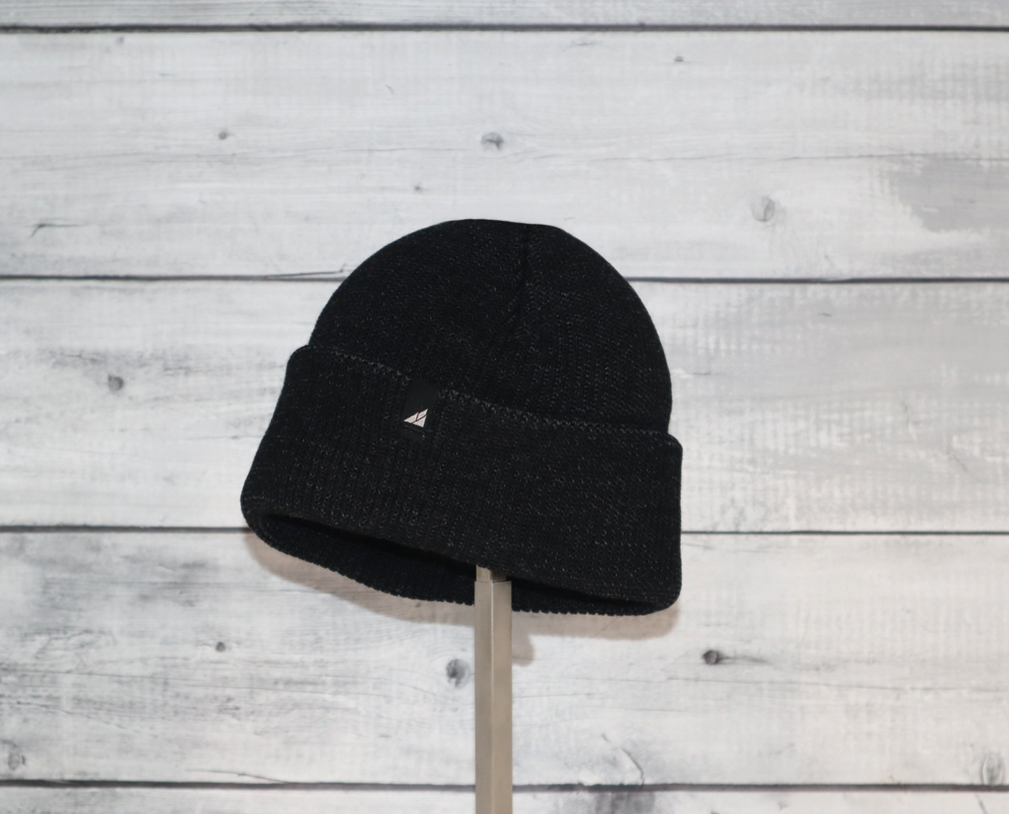 Child Acrylic Cuff Hat – Soft Knit Beanie for Kids in black color on display