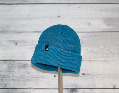 Child Acrylic Cuff Hat – Soft Knit Beanie for Kids in vibrant blue color, perfect for winter adventures.