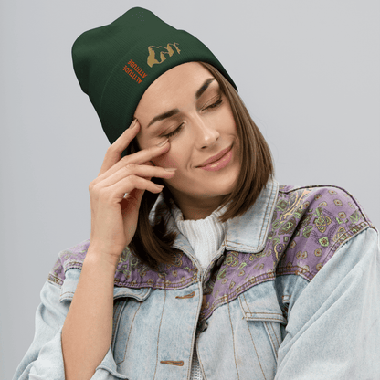 Mountain Beanie – Embroidered Knit Hat with Peak Style worn by a woman in a cozy setting.
