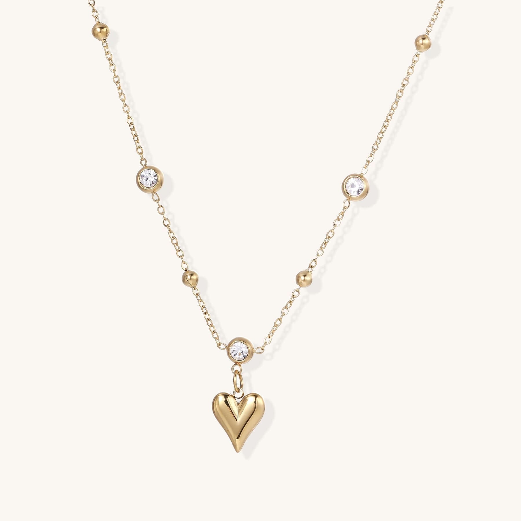 Crystal Heart Charm Necklace with Dainty 15mm Pendant and 45cm Chain featuring a gold heart charm and sparkling accents.