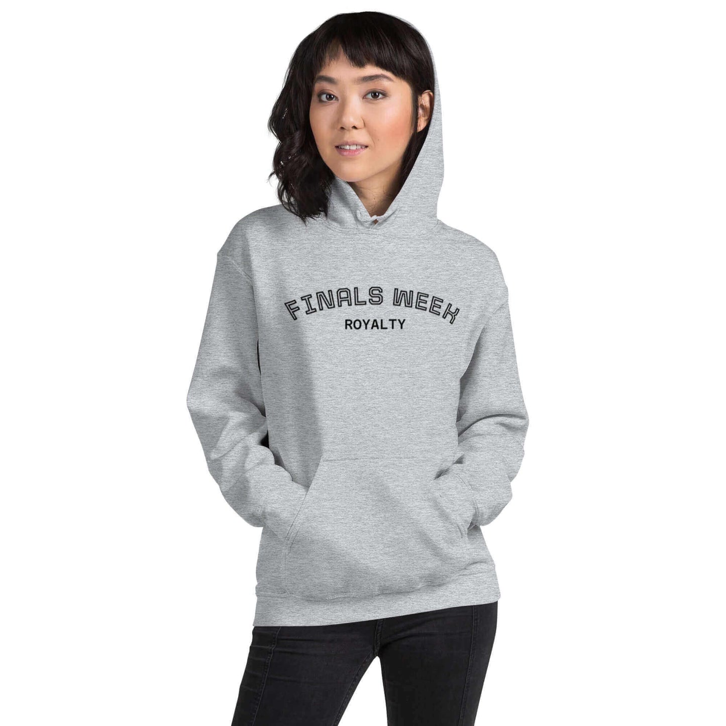 Custom College Hoodie – Your Mantra, Your Mood: Woman wearing a gray hoodie with 'FINALS WEEK ROYALTY' print.