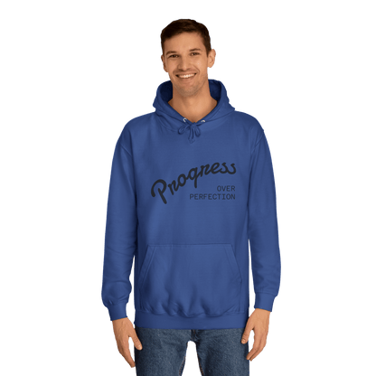 Custom College Hoodie – Add Your Photos, Text & Emojis Your Way worn by a man in blue with 'Progress Over Perfection' design.