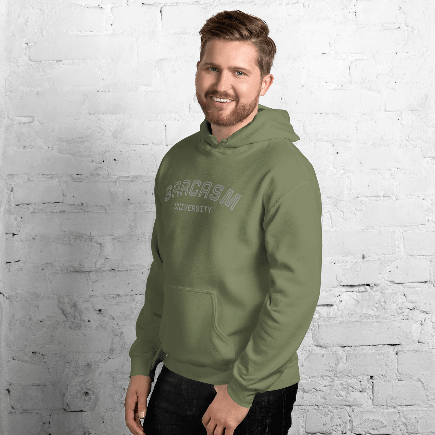 Custom College Hoodie – Your Mantra, Your Mood worn by a smiling man in a green hoodie with 'Sarcasm University' print.