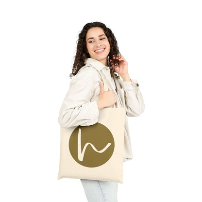 Custom Cotton Canvas Tote Bag – Upload Your Own Design being showcased by a smiling woman carrying it.