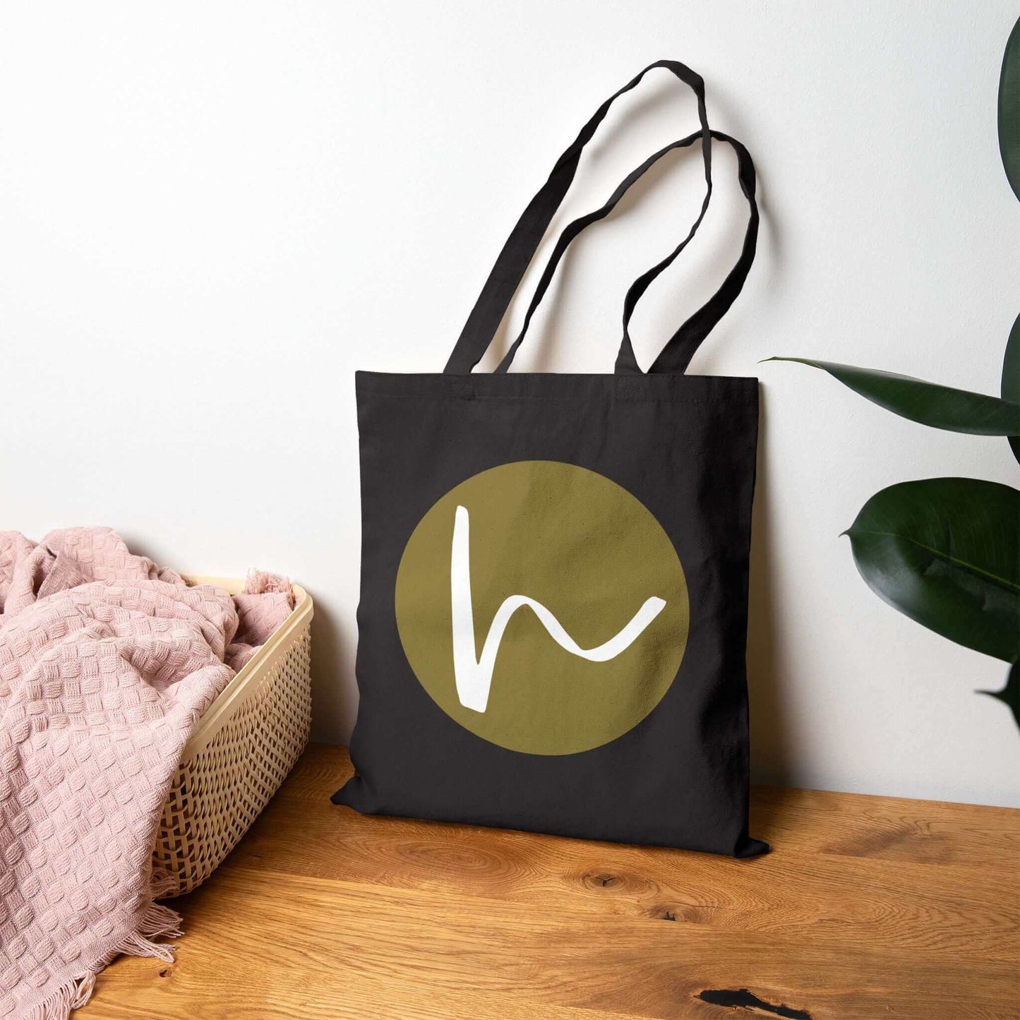 Custom Cotton Canvas Tote Bag – Upload Your Own Design featuring a stylish logo on a black background.