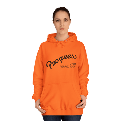 Custom College Hoodie – Add Your Photos, Text & Emojis Your Way in vibrant orange with 'Progress Over Perfection' design.