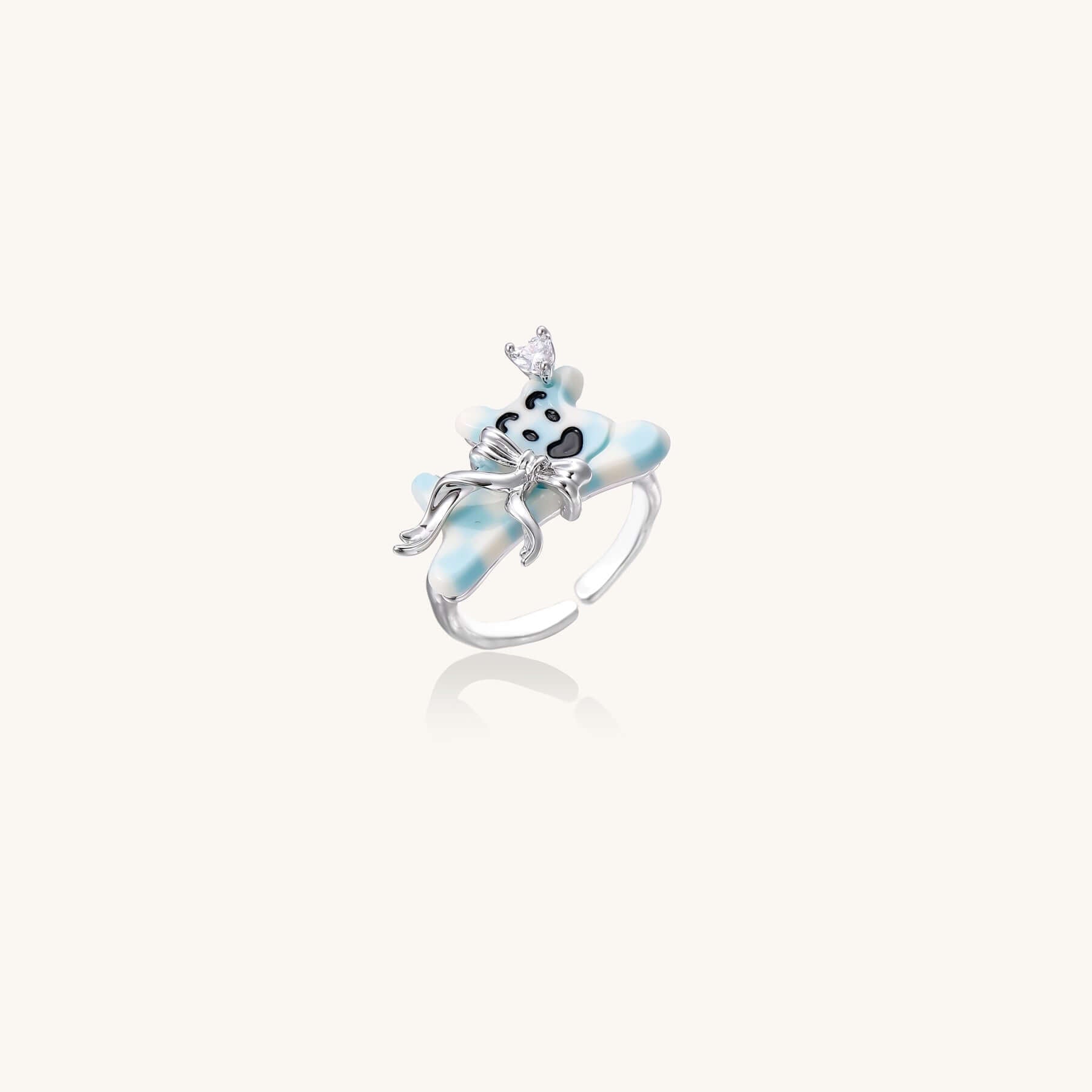 Dreamy Panda Flower Ring featuring a panda with a crystal crown and blue petals, perfect for any stylish look.