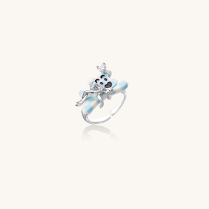 Dreamy Panda Flower Ring featuring a panda with a crystal crown and blue petals, perfect for any stylish look.