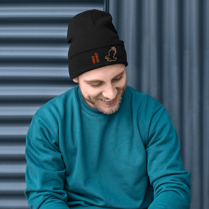 Eagle Beanie – Embroidered Knit Hat with Custom Text worn by a smiling man in a teal sweater.