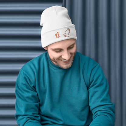 Eagle Beanie – Embroidered Knit Hat with Custom Text worn by man in teal sweater, smiling against a textured background.