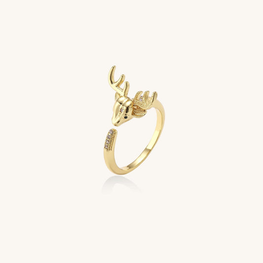 Enchanted Forest Deer Ring featuring a golden stag head with antlers and cubic zirconia details.
