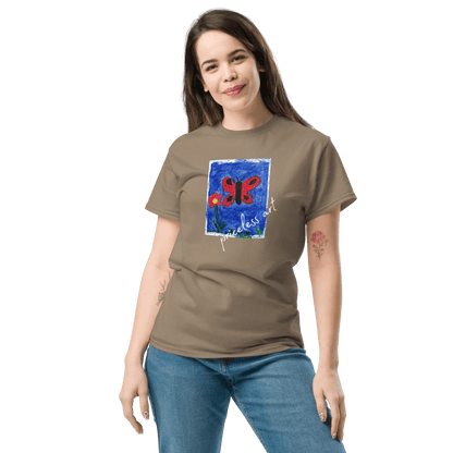 Freestyle Unisex T-Shirt – Upload Photos, Add Text & Emojis Your Way model wearing a custom graphic tee with butterfly design.