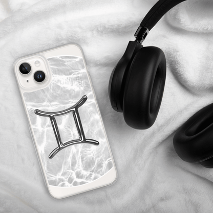 Zodiac Gemini Magsafe clear iPhone case on soft fur with headphones, featuring marble metallic design.