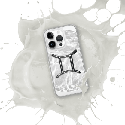 Gemini Magsafe iPhone case with marble design and metallic symbol, splashed in white liquid.