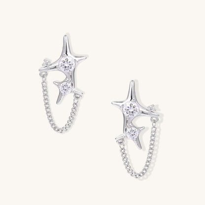 Gold Star Chain Earrings with Zirconia Sparkle and Celestial Charm featuring double star studs and delicate chain.