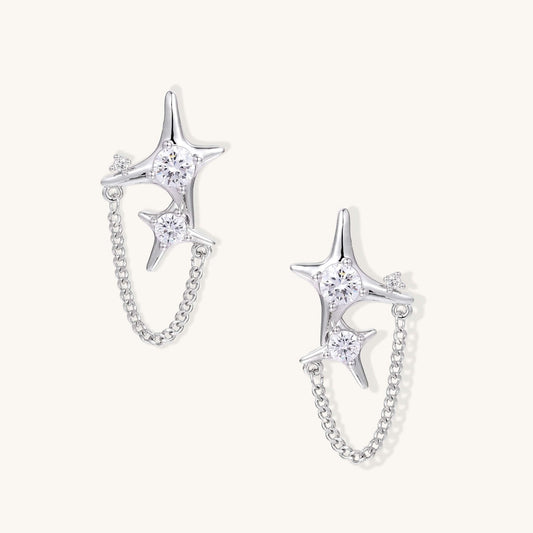 Gold Star Chain Earrings with Zirconia Sparkle and Celestial Charm featuring double star studs and delicate chain.
