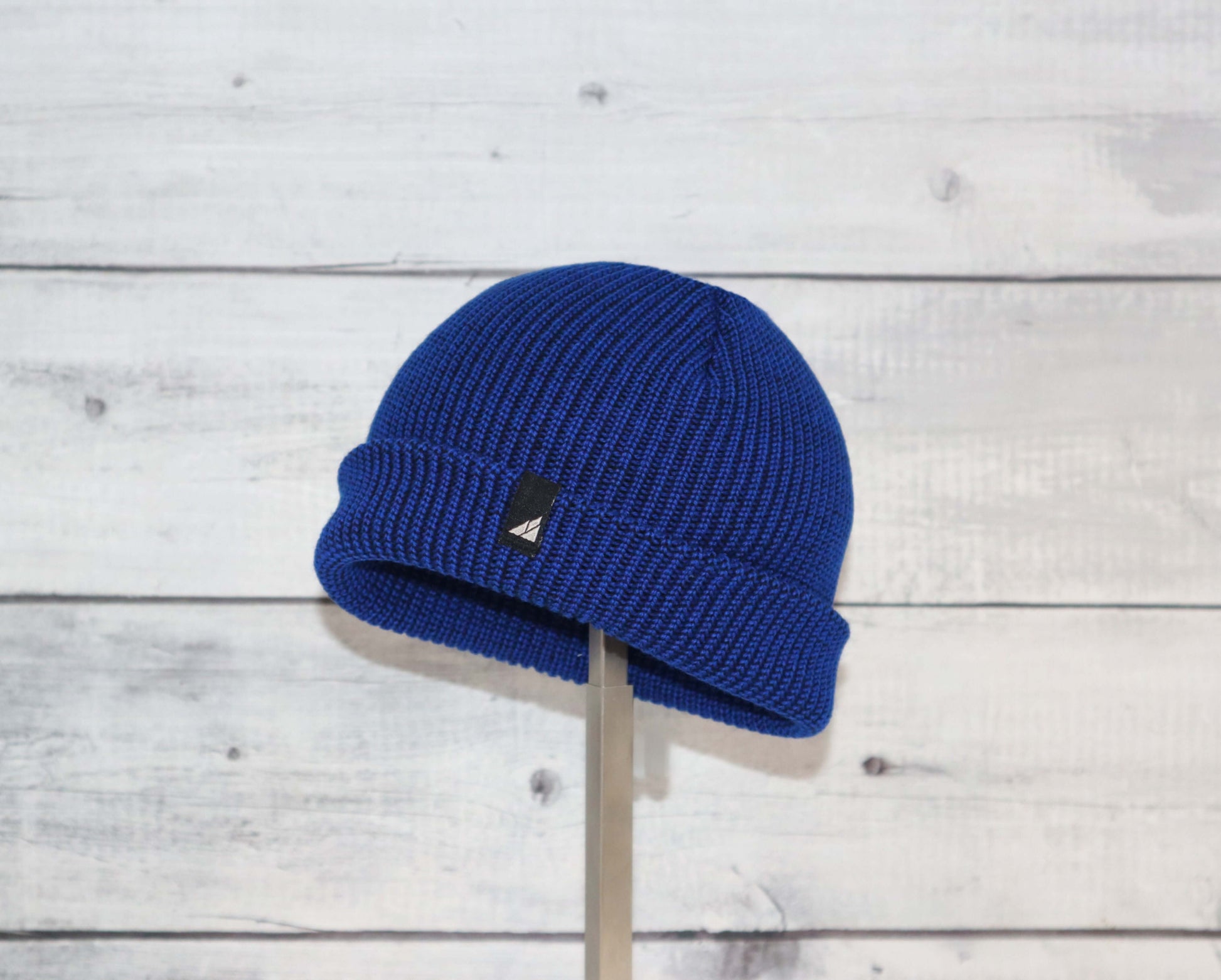 Infant Acrylic Cuff Hat – Soft Knit Beanie for Ages 3–12M in blue color on display.