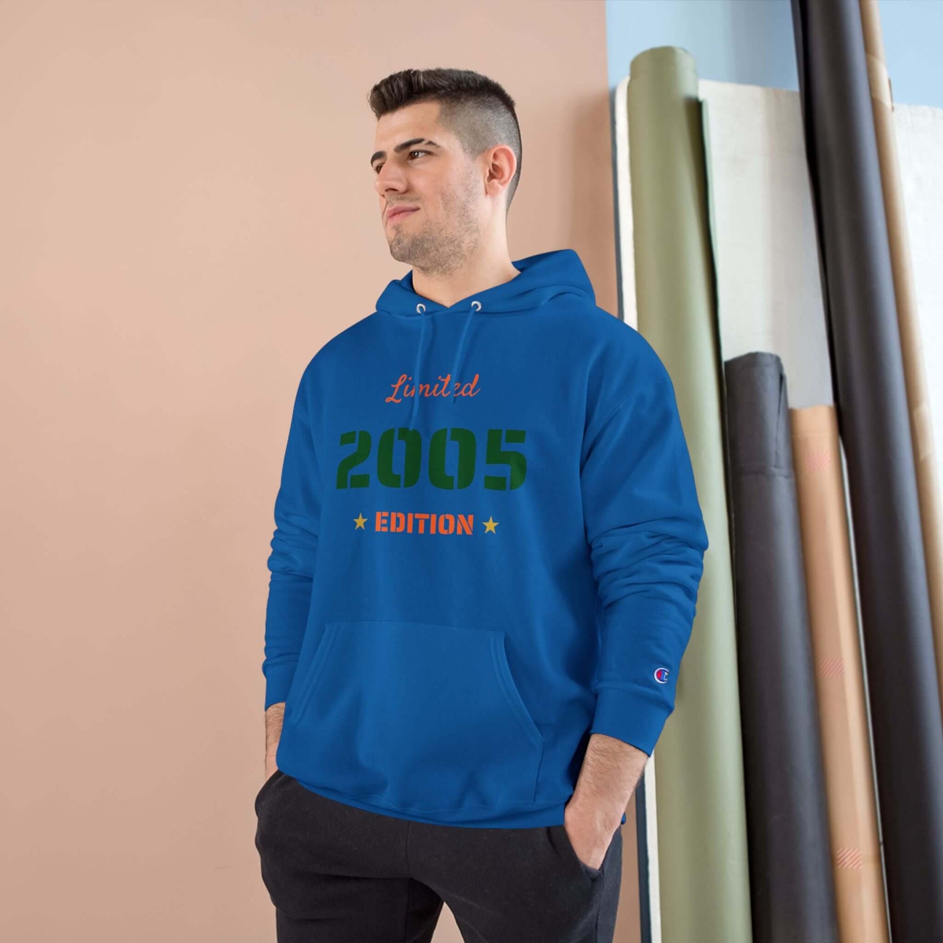 Limited Edition Year Hoodie – Champion Comfort, Collegiate Colors in blue worn by model with 2005 design