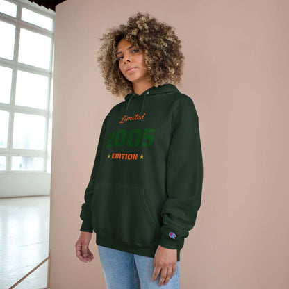Limited Edition Year Hoodie – Champion Comfort, Collegiate Colors in dark green worn by young woman.