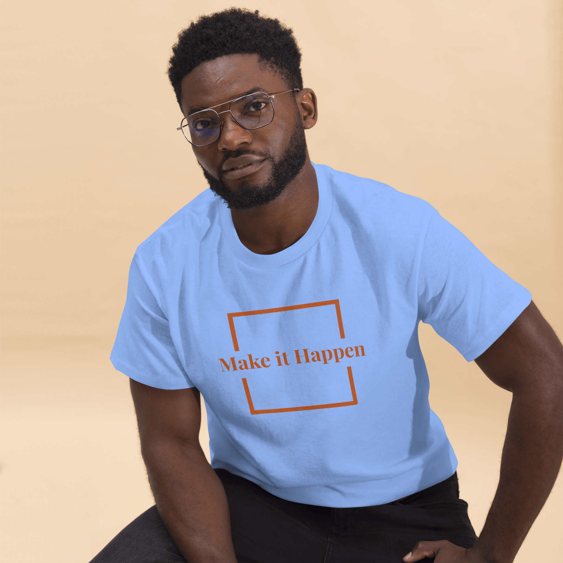 Freestyle Unisex T-Shirt – Upload Photos, Add Text & Emojis Your Way modeled by a man in a blue shirt with 'Make it Happen' text.