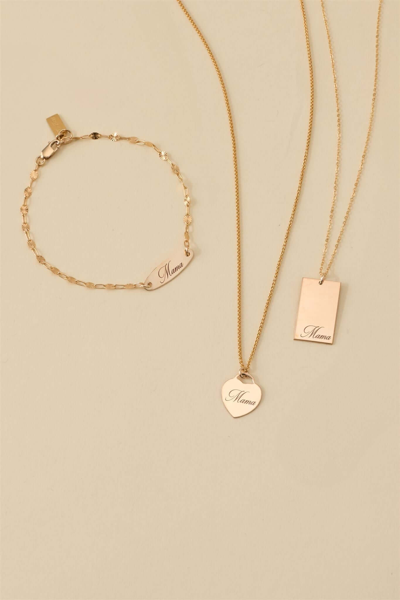 Mama Alice Necklace – 14k Gold-Filled Heart on Wheat Chain alongside coordinating jewelry pieces.