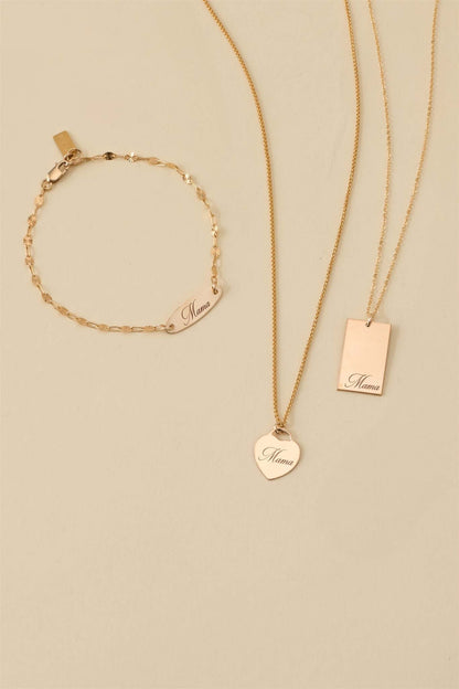Mama Alice Necklace – 14k Gold-Filled Heart on Wheat Chain alongside coordinating jewelry pieces.