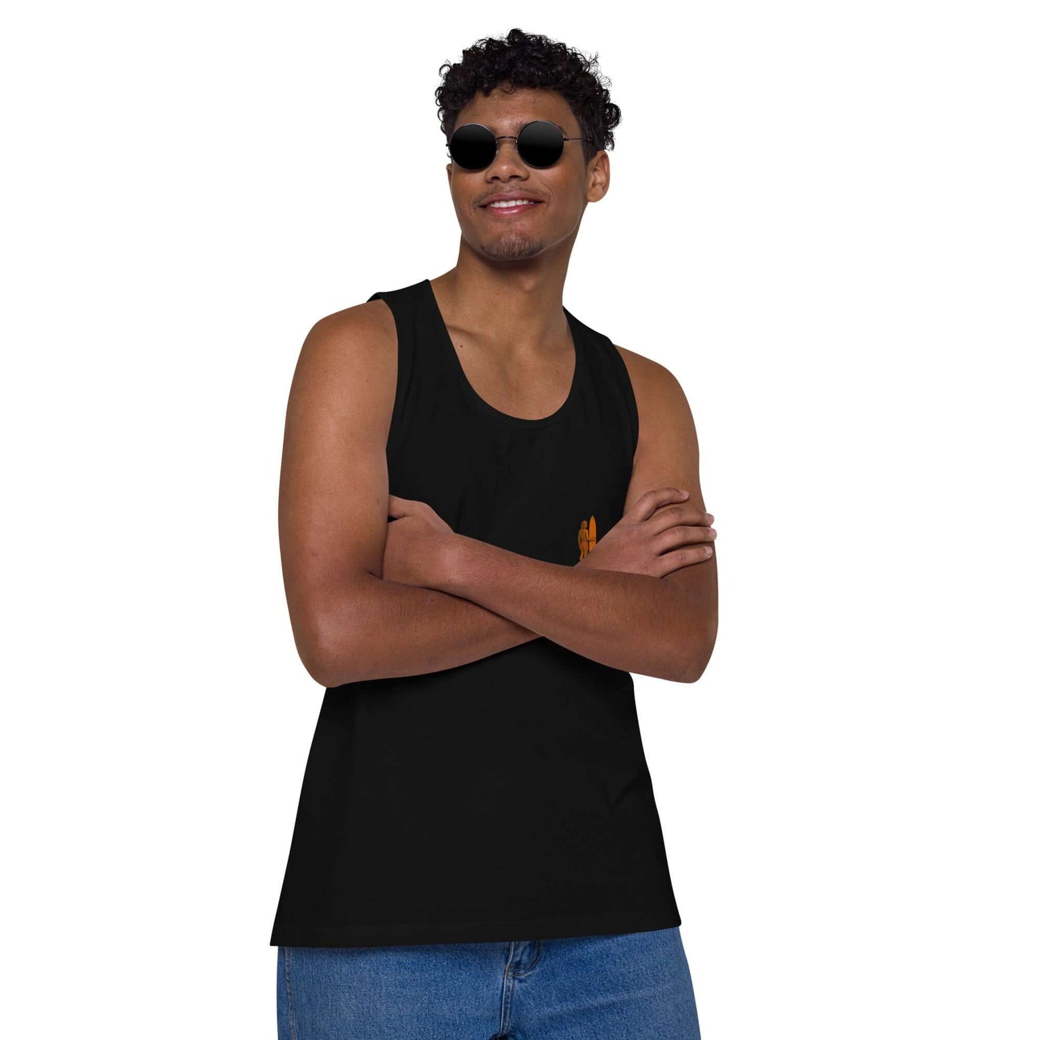 Model wearing black Sunset Dreams surf tank top, exuding coastal vibes and adventure spirit.