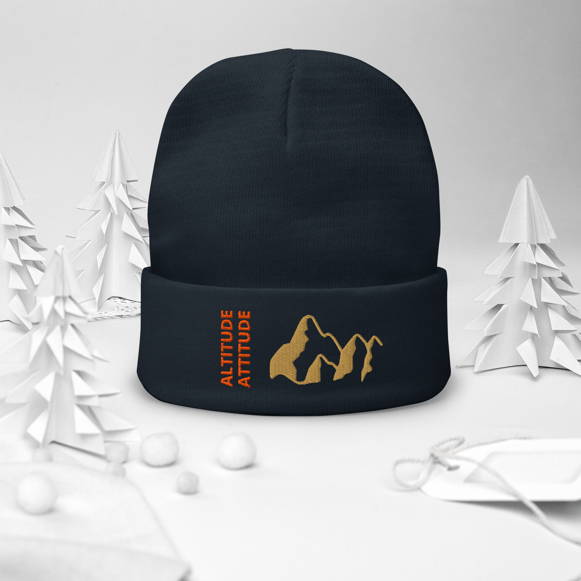 Mountain Beanie – Embroidered Knit Hat with Peak Style displayed among festive decor.